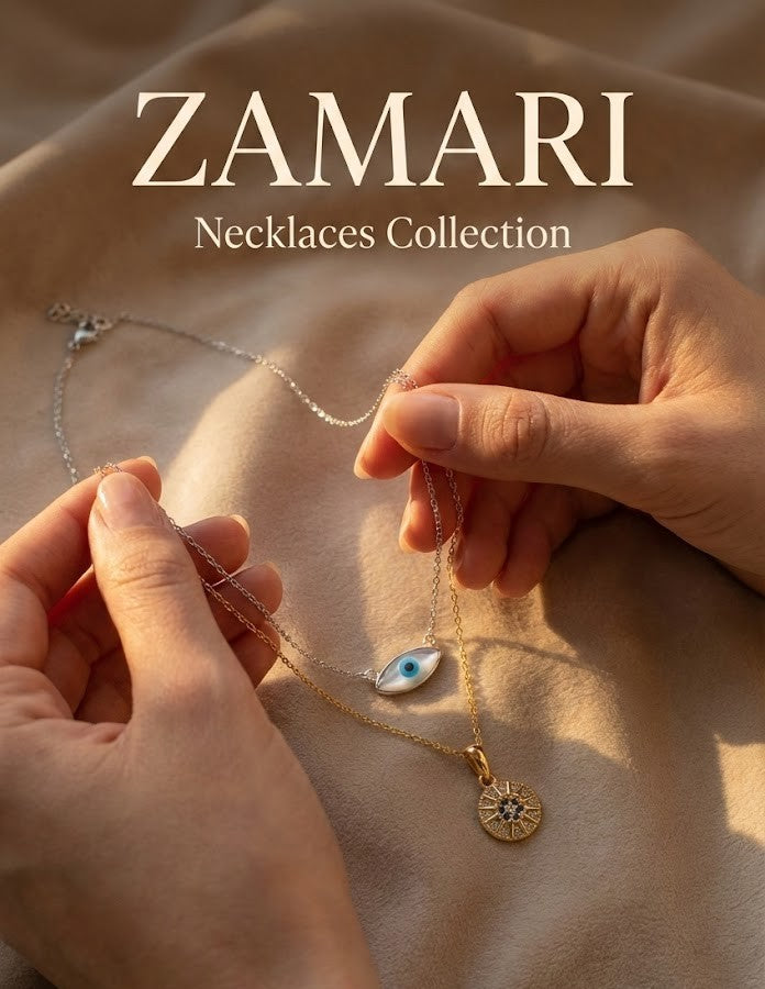 Canadian dainty Sterling silver necklaces with delicate pendants from Zamari collection held in hands on beige fabric