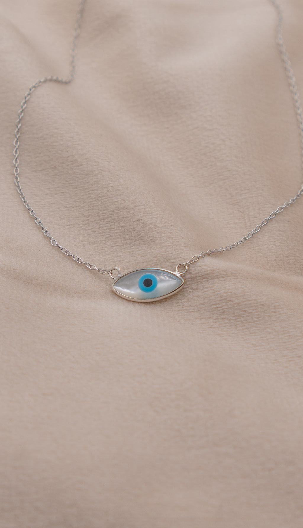 Zamari delicate silver necklace with blue eye pendant from online dainty jewelry boutique