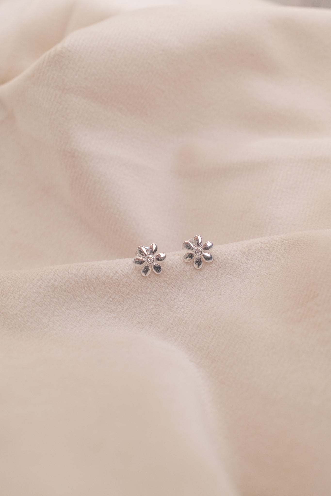 Zamari delicate flower stud earrings featured in an online dainty jewelry boutique collection