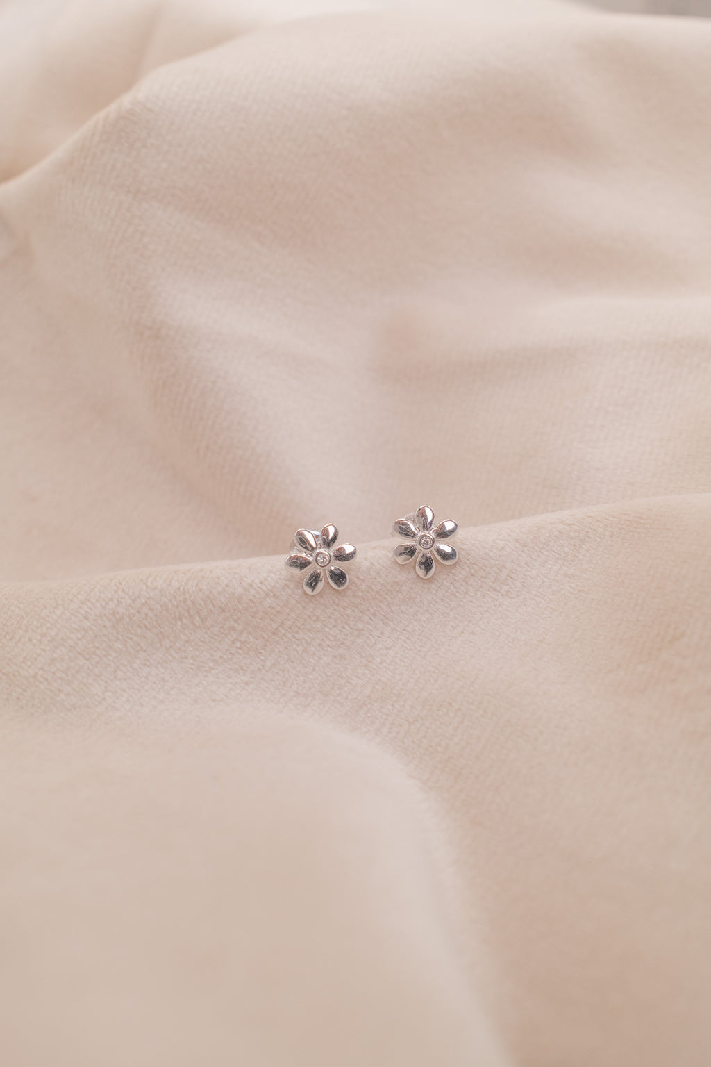 Zamari delicate flower stud earrings featured in an online dainty jewelry boutique collection