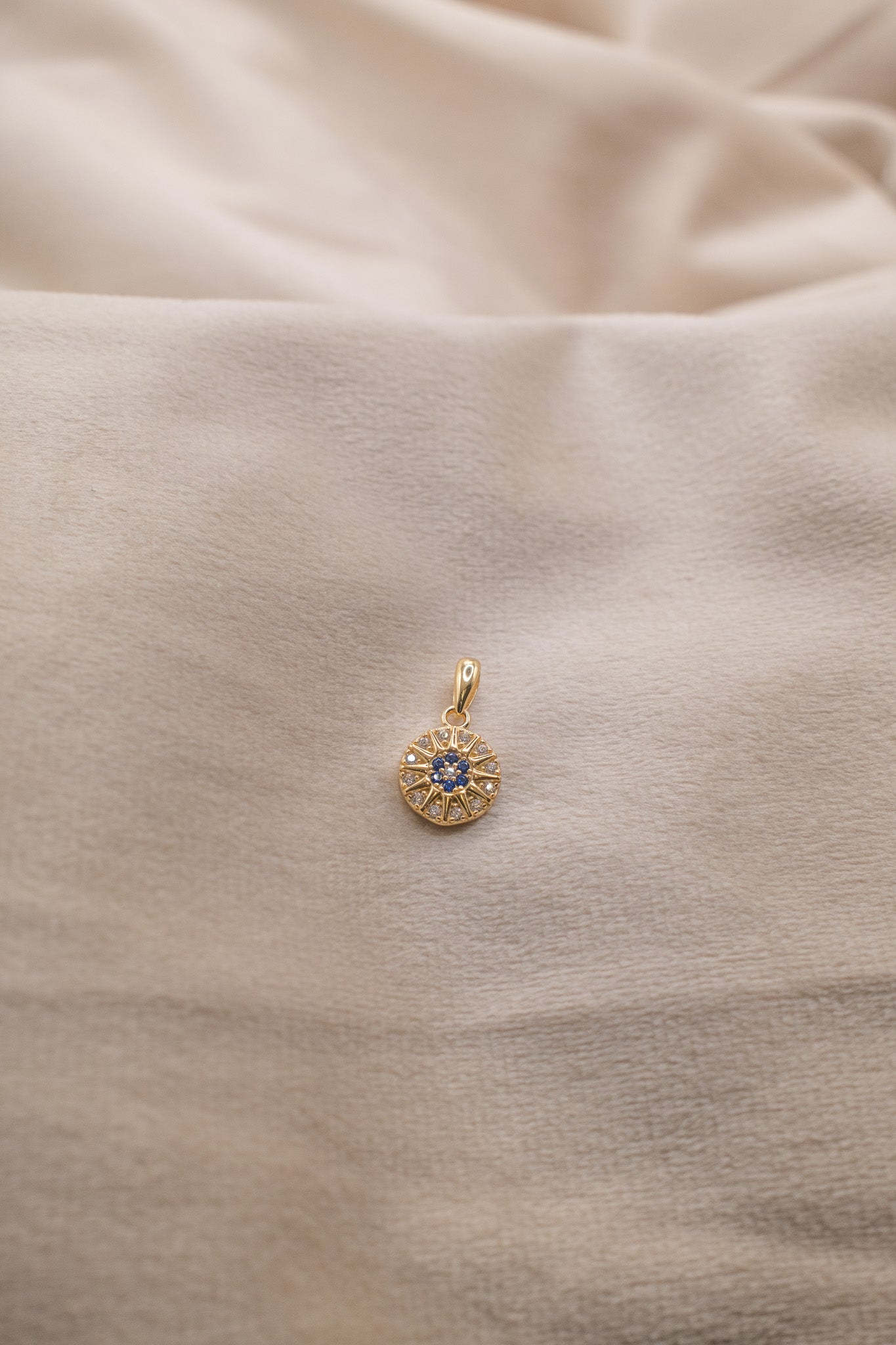 Zamari gold necklace pendant with blue gemstone from online dainty jewelry boutique