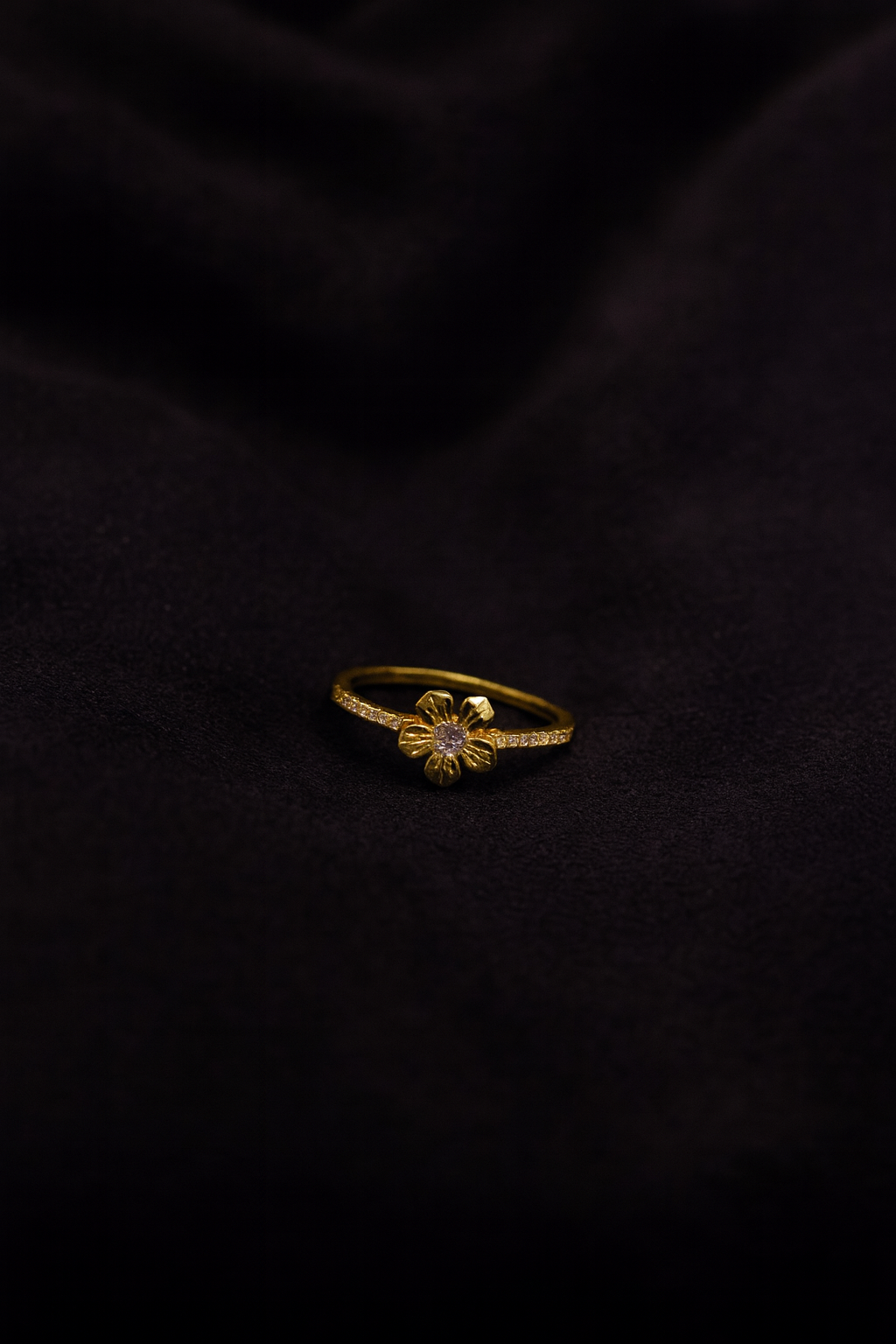 Zamari gold flower ring with gemstone details from online dainty jewelry boutique
