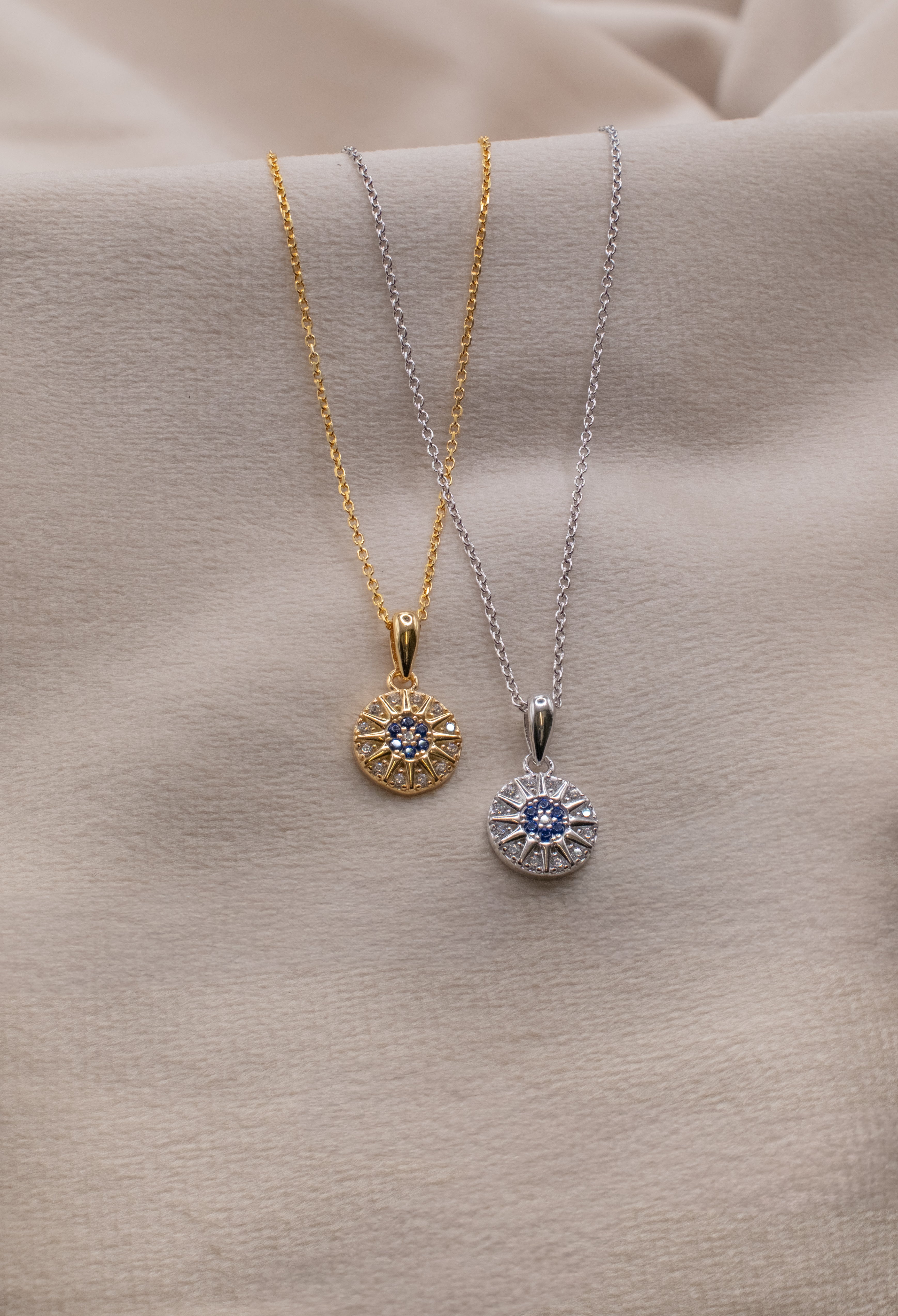 Zamari gold and silver necklaces with blue gemstone pendants from online dainty jewelry boutique