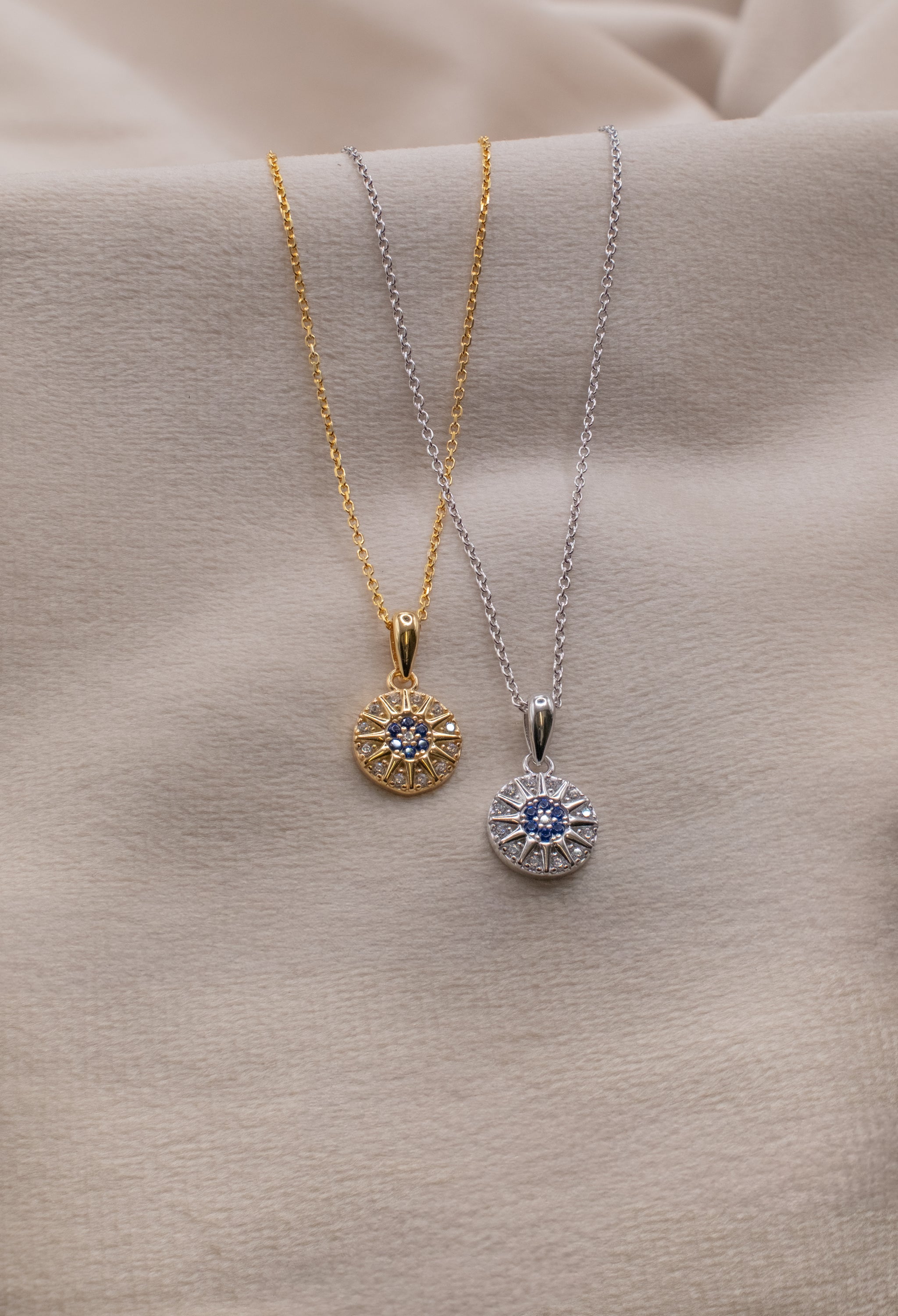 Zamari gold and silver necklaces with blue gemstone pendants from online dainty jewelry boutique