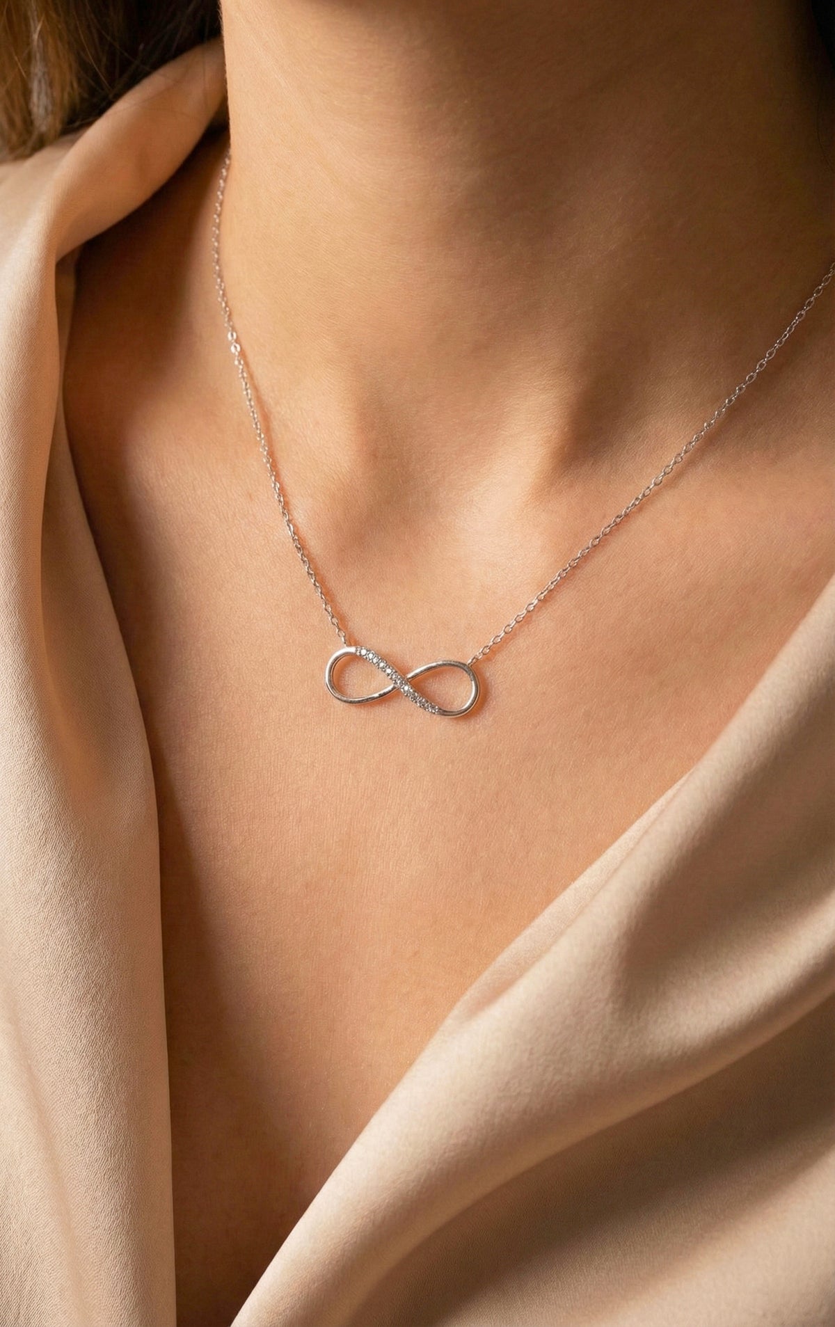 Zamari infinity necklace from online dainty jewelry boutique featuring delicate silver chain