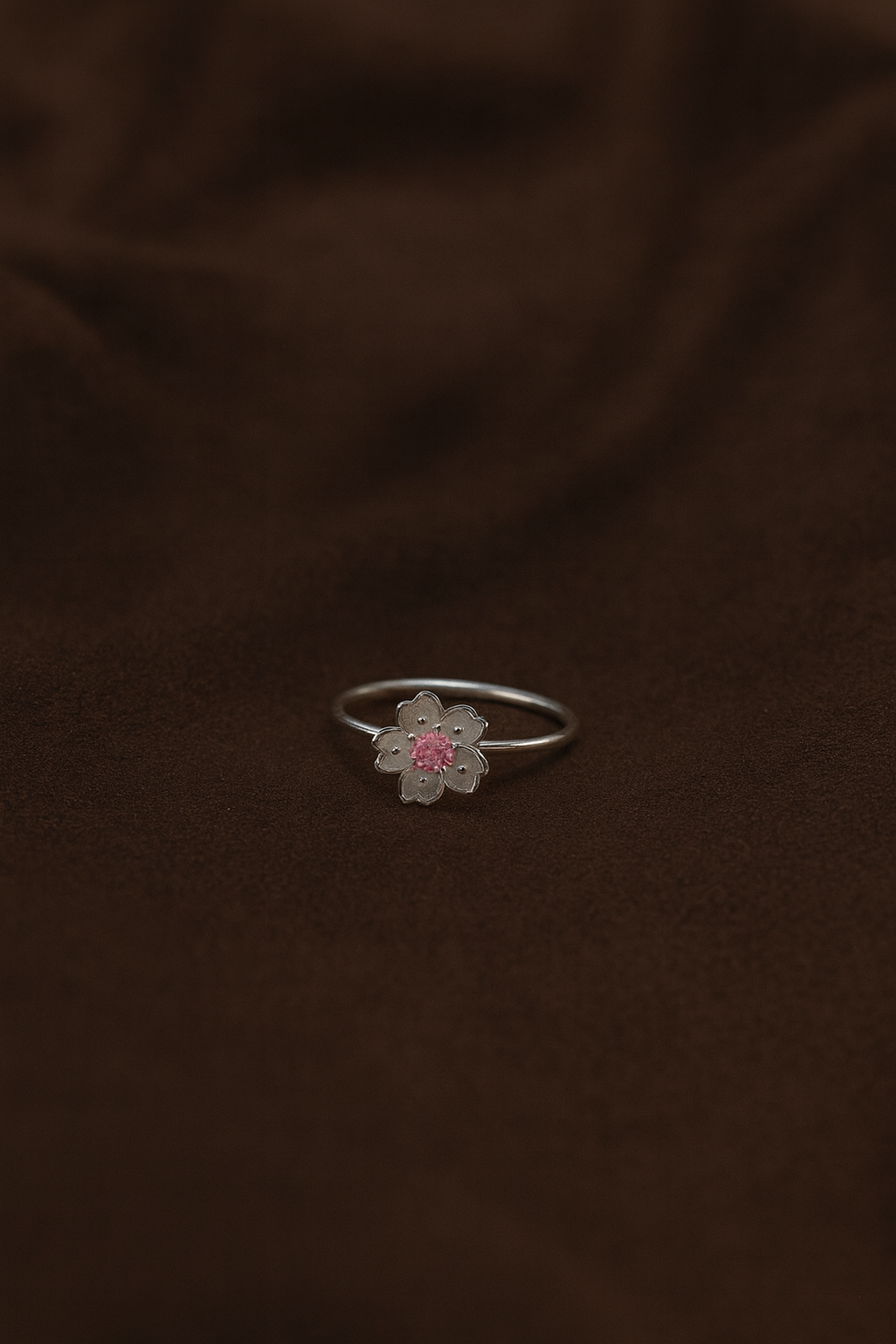 Zamari delicate flower ring with pink center stone from online dainty jewelry boutique