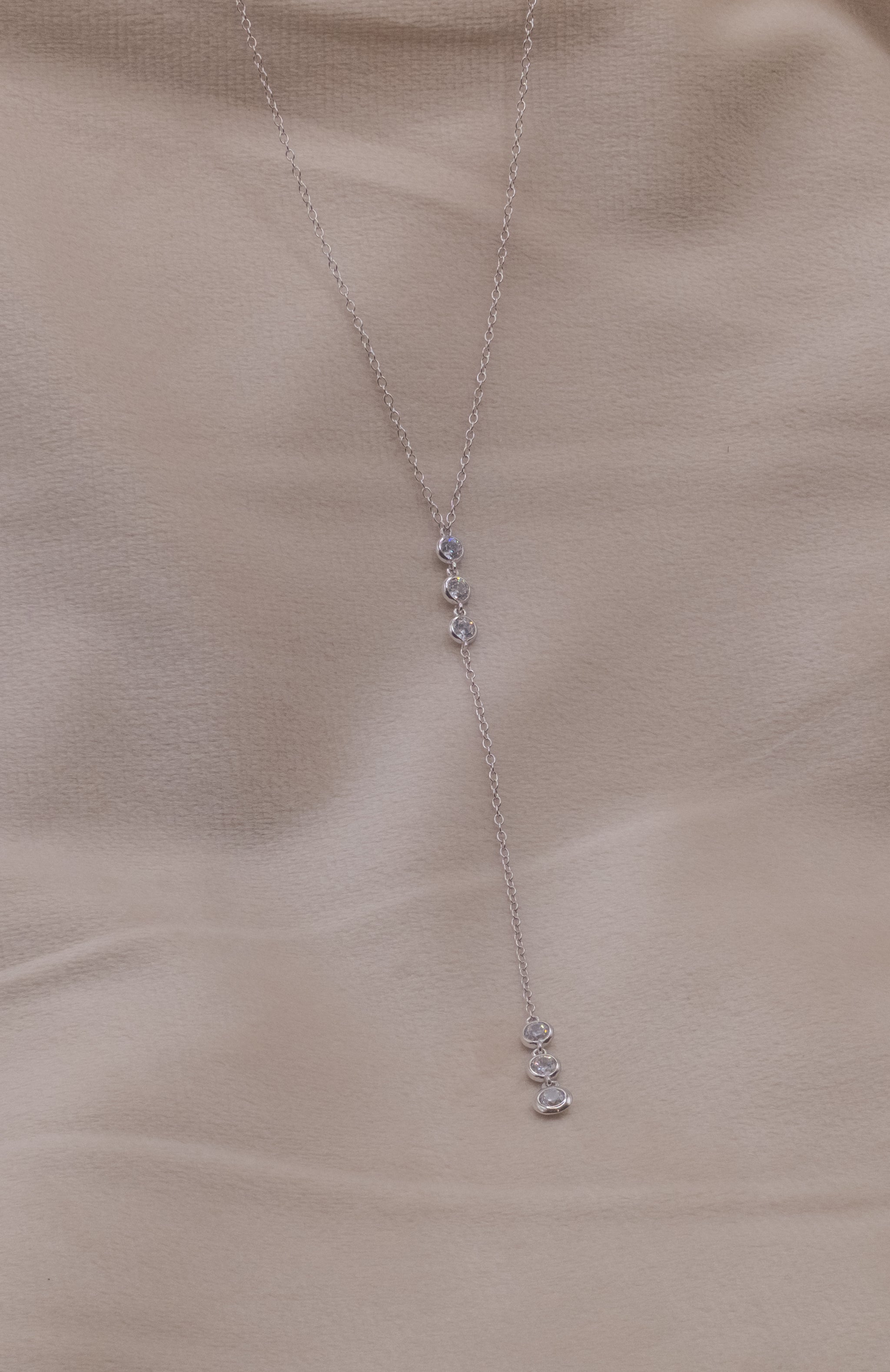 Zamari silver lariat necklace with sparkling stones from an online dainty jewelry boutique