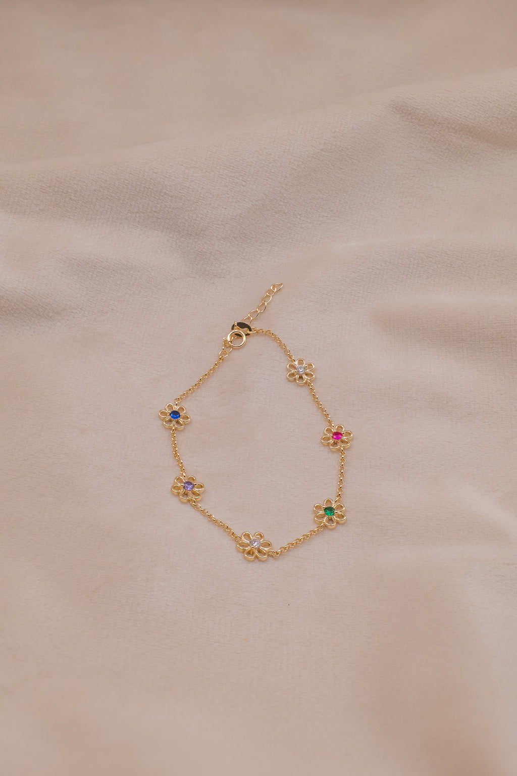 Zamari gold bracelet with colorful flower charms made of sterling silver jewelry