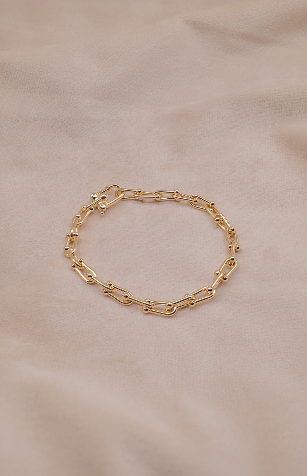 Zamari gold chain bracelet showcasing elegant design as sterling silver jewelry accessory