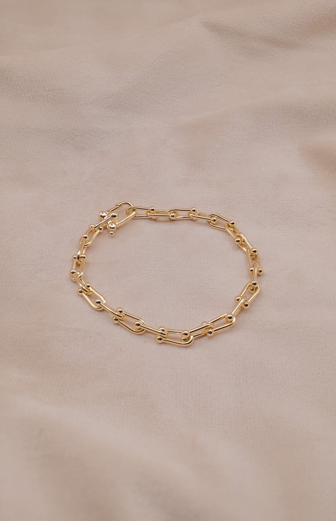 Zamari gold chain bracelet showcasing elegant design as sterling silver jewelry accessory